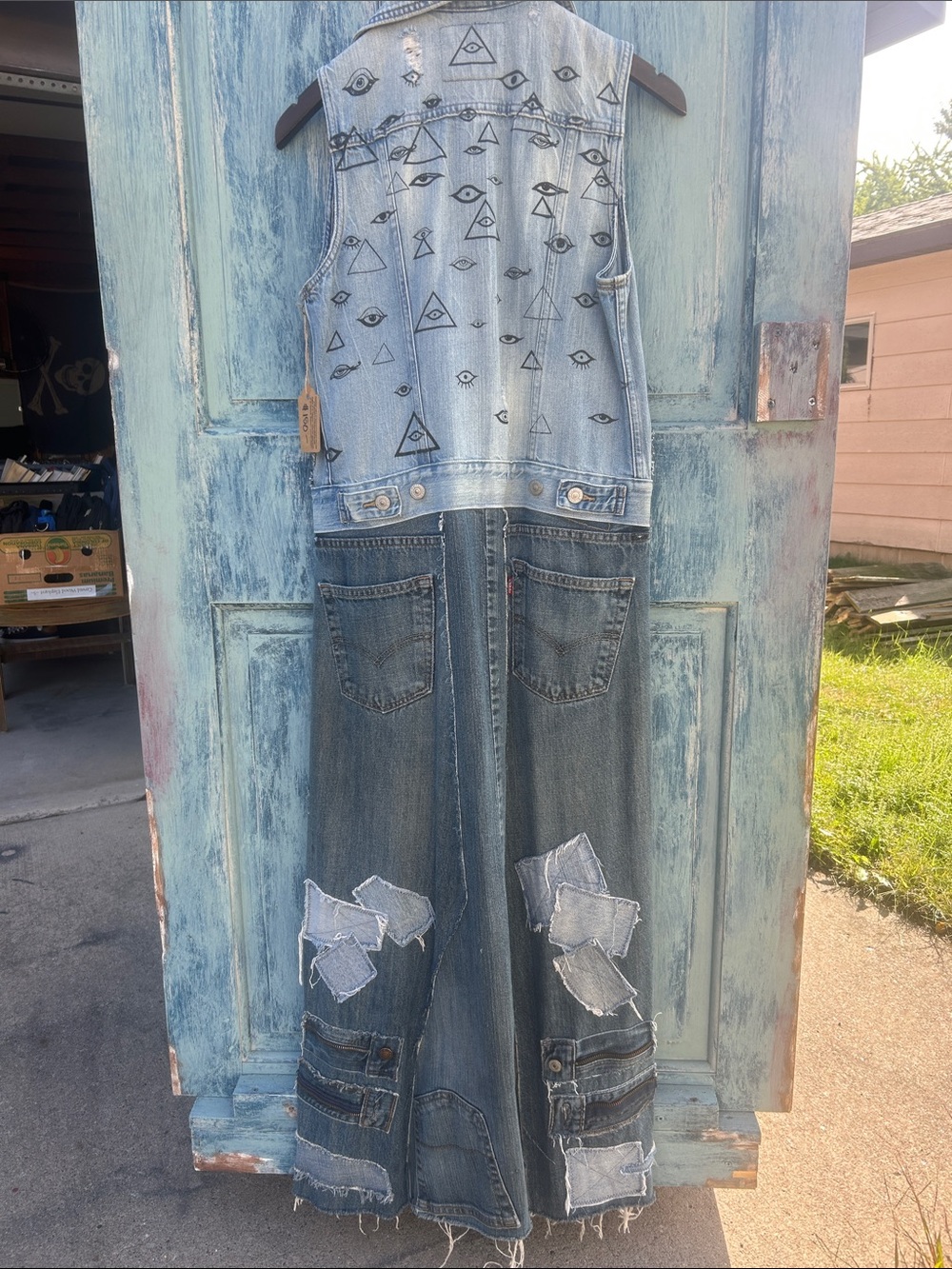 Upcycled esoteric pyramid all seeing eye patched Levi’s denim duster jean vest